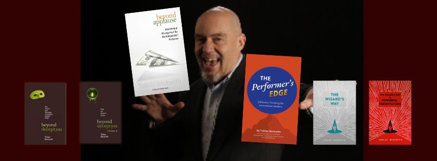 Tobias Beckwith with 6 books for Magicians and Business Leaders